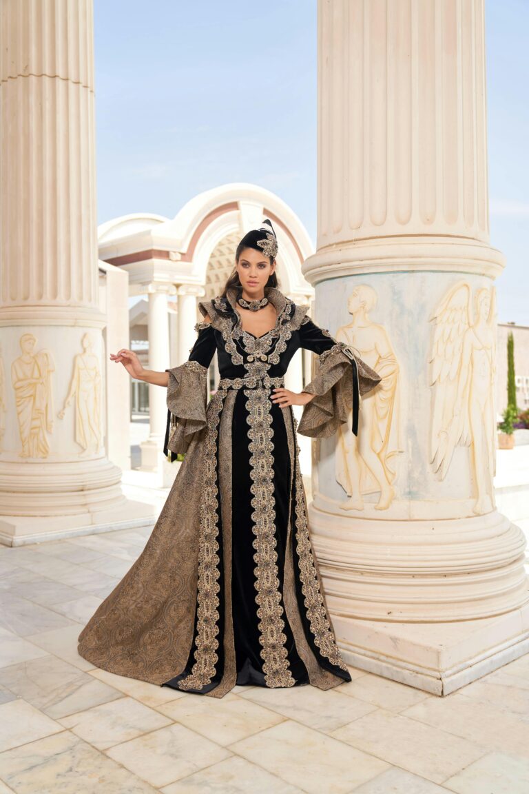 Dazzling bridal attire showcased against İzmir's classical architecture.